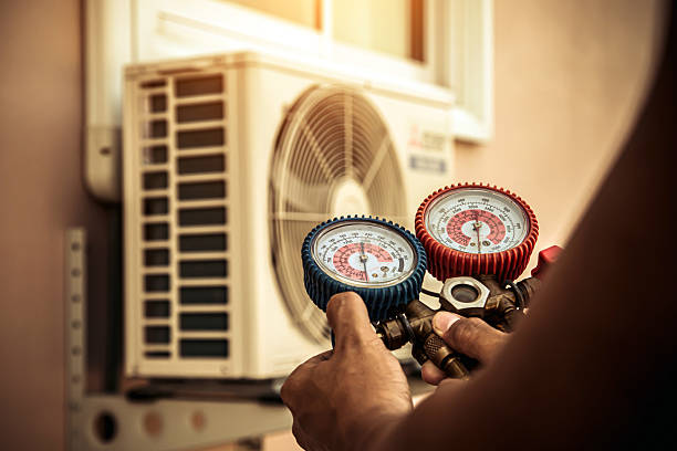 Professional Hvac Maintenance technician working in Dracut, MA
